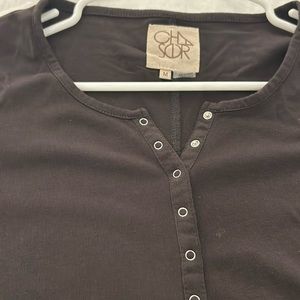 Black chaser long sleeve t. With bell sleeves . He let style front